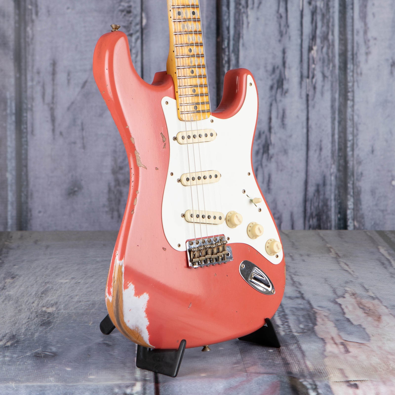 https://www.replayguitar.com/cdn/shop/files/Fender-Custom-Shop-Limited-1956-Stratocaster-Heavy-Relic-Electric-Guitar-Faded-Aged-Tahitian-Coral-20947-2_1600x1600.jpg?v=1700580460