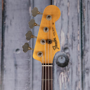 Fender Custom Shop Limited 1964 Jazz Bass Journeyman Relic Electric Bass Guitar, Aged Fiesta Red, front headstock