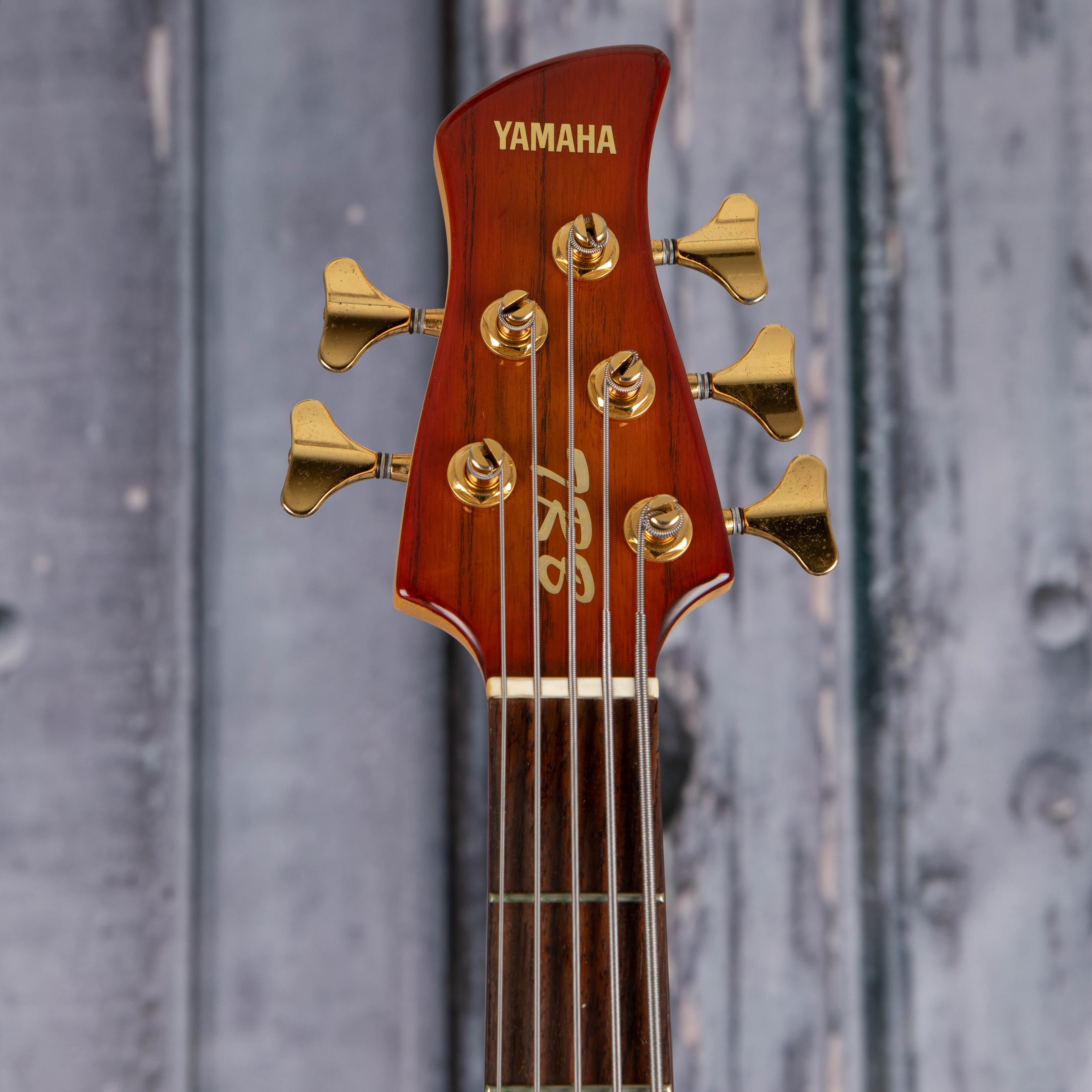 Used Yamaha TRB-5IIL Left-Handed 5-String Electric Bass Guitar, Honeyburst, front headstock